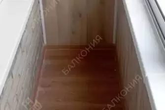 Холодное остекление балкона с отделкой