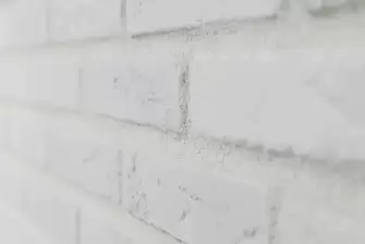 Облицовка П-образного балкона искусственным камнем с утеплением