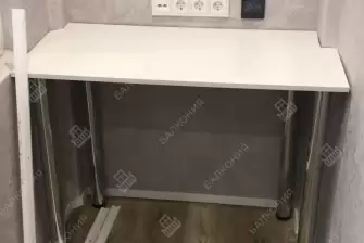 Отделка балкона гипсокартоном и ламинатом с установкой шкафа и тумбы