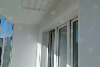 Остекление балкона и отделка стен