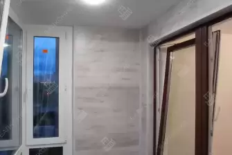 Отделка балкона с установкой теплого пола и остекление Рехау 70