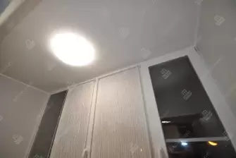 Остекление балкона с отделкой